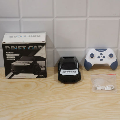 Remote Control Police Drift Car With Follow Modemist Spraylights And Music Set